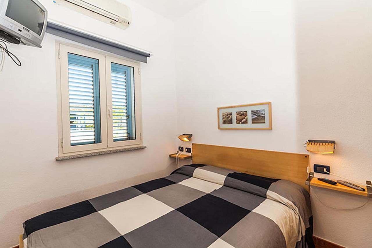 Апарт отель Le Residenze Blu Sardinia Ла-Калетта Экстерьер фото