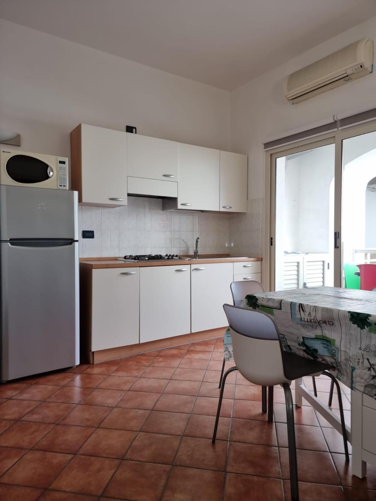 Апарт отель Le Residenze Blu Sardinia Ла-Калетта Экстерьер фото