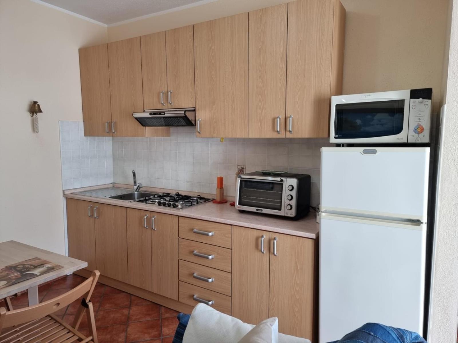 Апарт отель Le Residenze Blu Sardinia Ла-Калетта Экстерьер фото